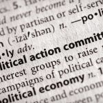 Redistricting BOMBSHELL: Texas’s Controversial Map BLOCKED Close-up of a dictionary entry for political action committee