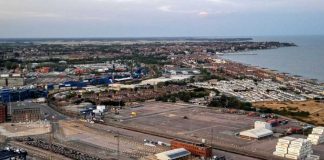 Covert Israel Move Near Red Sea Aerial view of coastal port and town with container yard