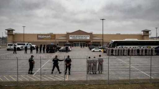 Law enforcement officers and detainees outside a secure detention facility at a Walmart location