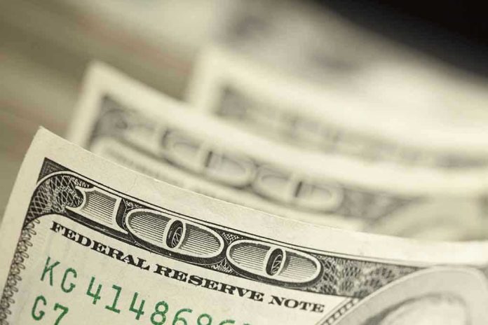120456253 Close-up of hundred-dollar bills.