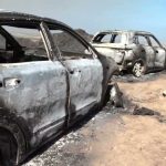 Wreckage shows charred cars used by victims of Spain's deadly wildfire