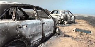 Wreckage shows charred cars used by victims of Spain's deadly wildfire