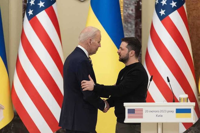 shutterstock_2264967977 Two men shake hands at a podium with U.S. and Ukrainian flags