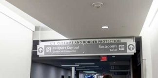 Hijacker Walks? Judge Drops a Bombshell Woman walking towards US customs and passport control