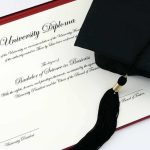 Colleges Could Lose Federal Aid Under New Degree Criteria Graduation cap and diploma on a red folder