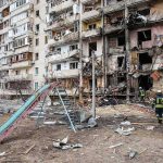 Ballistic Hell Hits High-Rises in Ukraine Damaged apartment building behind a playground slide