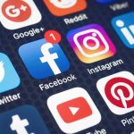 Judge Hammers Meta Over Teen Harm Smartphone screen showing social media app icons