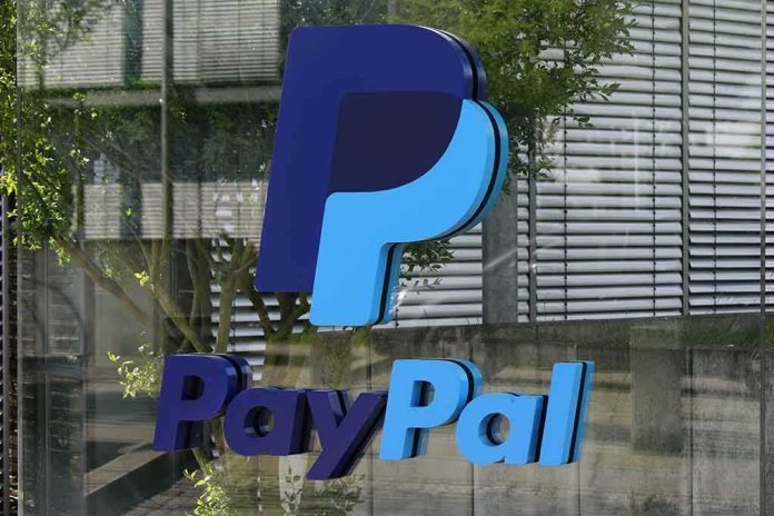 shutterstock_579778828 PayPal logo on a glass building facade