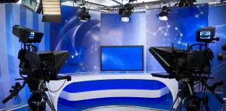 Trump Walks Out, Claims California Rigged A television studio setup with cameras and a blue backdrop