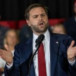 Talarico Says He ‘MISSED THE MARK’ on Past Positions Man in suit speaking at a podium