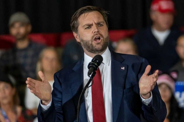 Man in suit speaking at a podium