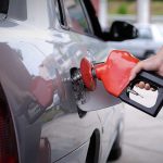 Iran’s Fuel Shortage Is Getting WORSE A person refueling a car at a gas station