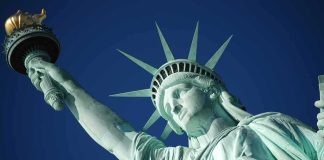 CIA Just Dropped Dozens of Secret 9/11 Files Statue of Liberty holding torch against clear blue sky