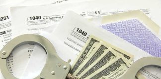 Trump Administration Makes UNPRECEDENTED Extradition Move Handcuffs on tax forms with cash
