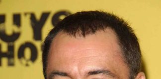 Joe Rogan Wants AI to Run the Government Smiling man with short hair and stubble