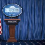 Supreme Court Gives Trump Another BIG WIN! White House press briefing podium with U.S. flag and blue curtain