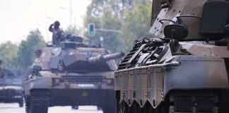 Army Built a Tank Its Crew Couldn’t Survive Military tanks drive down a city street