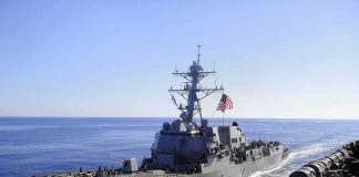 Southcom Took Out Four More Narco-Terrorists naval destroyer sailing at sea with flag flying