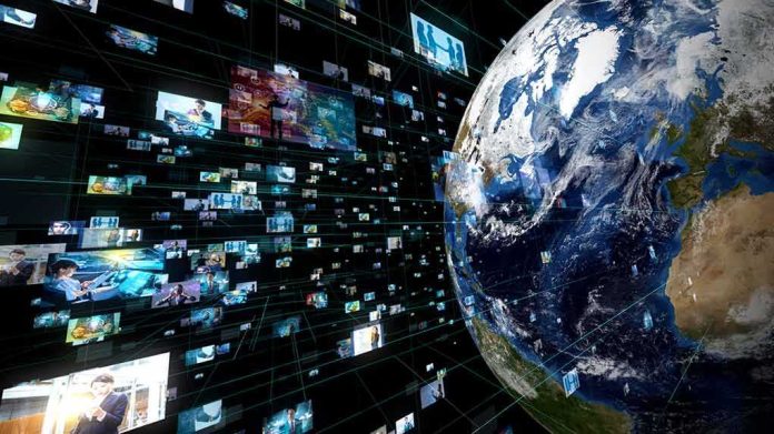 shutterstock_1276632529 Earth with floating digital screens and data grid