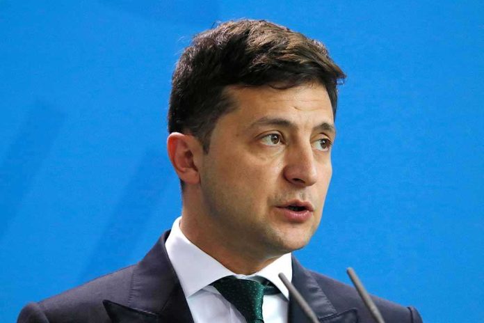 Volodymyr Zelensky speaking at a podium against a blue backdrop