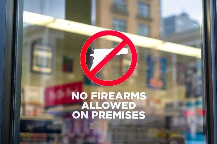 No firearms allowed sign on a store window