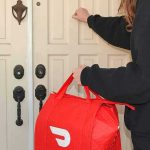 DoorDash Delivery Goes X-Rated Food delivery worker knocking on a front door with a red insulated bag