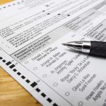 How Socialists Are Taking Hold of the Democratic Party Ballot paper with pen on wooden surface