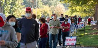 How This Demographic Could Flip Alaska Christian Jones and others waiting in a long line outside a polling place