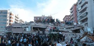 New Numbers Show the Scale of Gaza’s Economic Collapse Rescue workers and civilians on collapsed building after earthquake