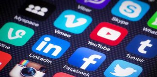 smartphone screen with social media app icons