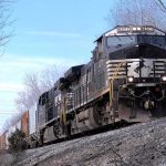 Diesel Squeeze Just Got Real Freight train locomotive on a wooded track