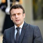 Pope Told Macron Exactly What He Opposes man in a dark suit speaking outdoors