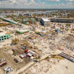 Powerful Storm Takes Aim at the East Coast Aerial view of coastal town with widespread storm damage