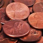 pile of copper pennies with heads side up