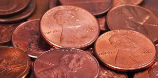 Your Change Jar Is About to Become History pile of copper pennies with heads side up