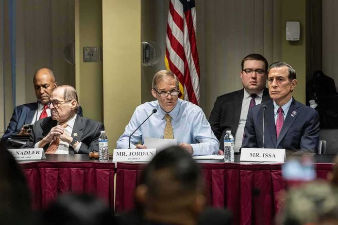 shutterstock_2290525775 Jim Jordan speaks at a committee hearing with Jerrold Nadler and Darrell Issa seated beside him