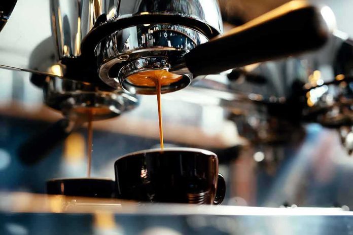 espresso machine pouring coffee into a cup