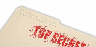 Manila file folder stamped TOP SECRET in red