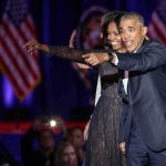 Obama’s 2008 Video Shocks Critics! Michelle Obama and Rob Nabors pointing on stage at an event