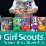 Even DOGS Can Buy Girl Scout Cookies Now?! Girl Scout displays assorted cookie boxes on a table