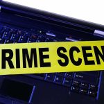 2 Ole Miss Students Found Dead in Separate Incidents Laptop keyboard with yellow crime scene tape across it