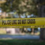 Businessman PISTOL-WHIPPED in Broad Daylight yellow police tape cordoning off an outdoor area