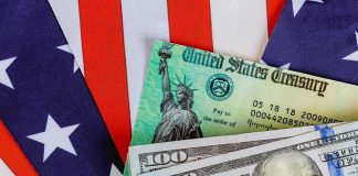 $6.25B Going Into Kids’ Trump Accounts U.S. Treasury check and hundred dollar bills on American flag