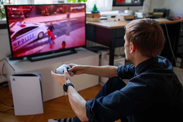 shutterstock_1862209111 man playing video game on a TV with a controller