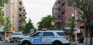 NYC Ends a 170-Year-Old TRADITION NYPD police SUV blocking a city street at a taped-off scene