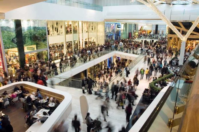 shutterstock_21143044 Crowded shopping mall interior with multiple levels