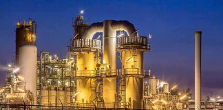 Blasts Knock Out Venezuela’s No. 2 REFINERY An industrial facility with illuminated structures at night