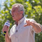 Robert F. Kennedy Jr. speaking outdoors with a microphone