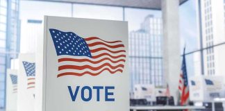 Texas Senate Candidate Lands a Surprise ENDORSEMENT Voting booth with American flag design in a modern polling place
