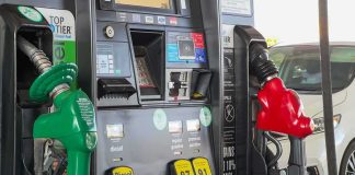 Trump’s Diesel Tax Break Could SAVE You Money Gas pump with green diesel and red gasoline nozzles